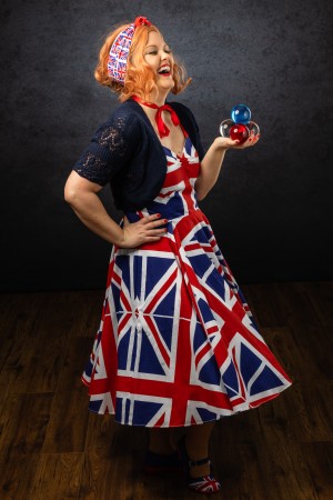 Amy in her 1950's style Union Jack dress called Union Jacqui, with red white and blue crystal balls. on the testimonials page