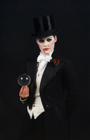 Amy in her vintage vamp top hat and tails outfit and crystal ball. 