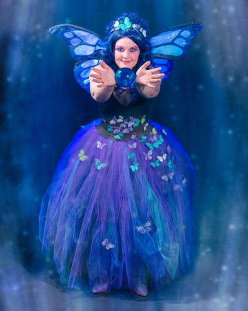 Amy in her purple and blue Magical Butterfly outfit with blue ball